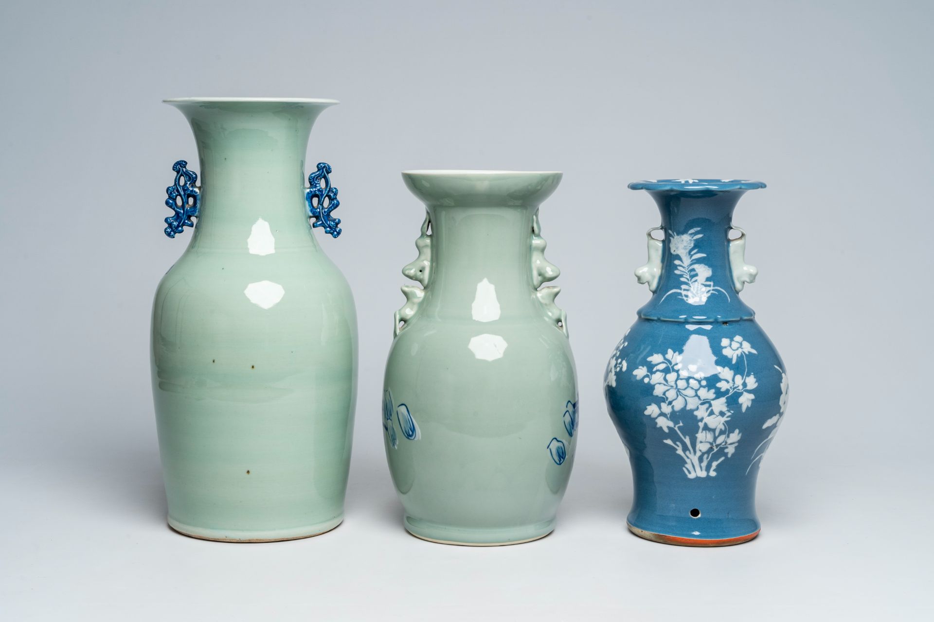 A Chinese slip-decorated blue ground vase with floral design and two blue and white celadon ground v - Image 3 of 6