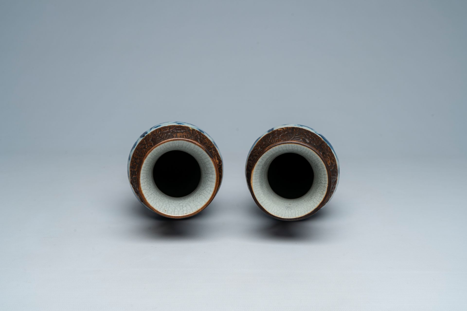 A pair of Chinese Nanking crackle glazed blue and white vases with birds and butterflies among bloss - Image 5 of 6