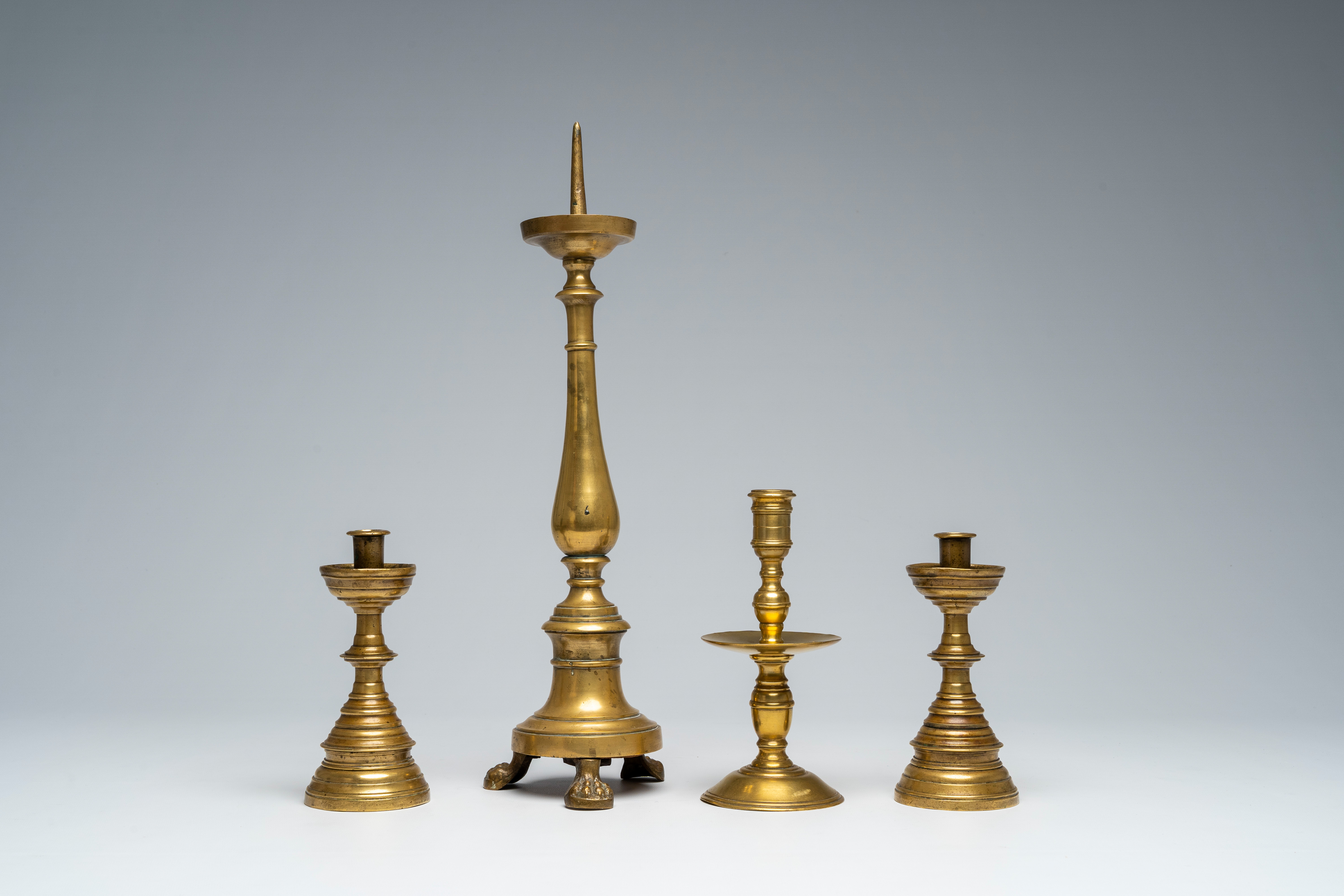 Four various bronze and brass candlesticks, 17th C. and later - Image 3 of 7