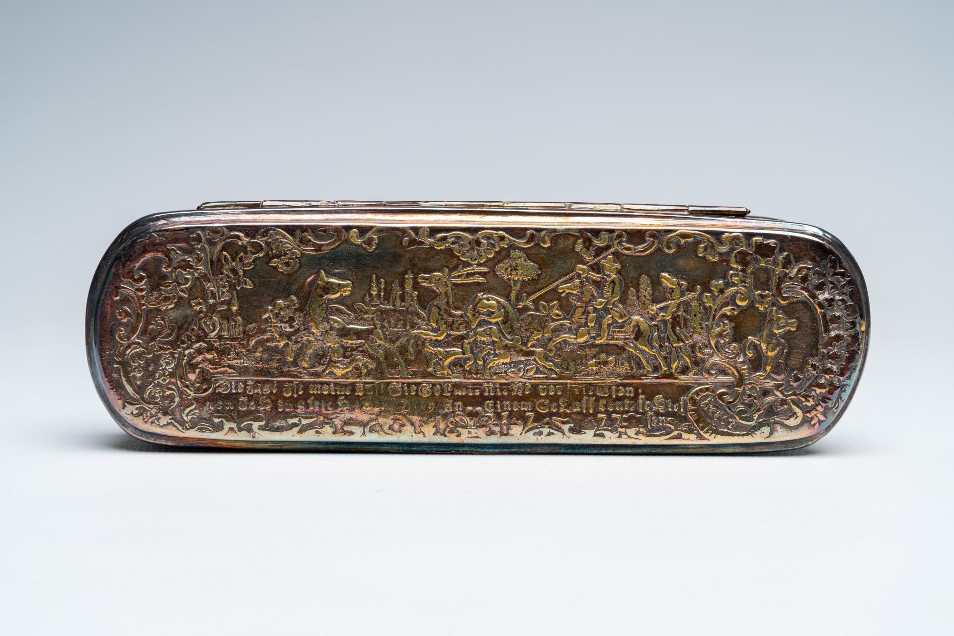 A German silver tobacco box with hunting scenes and an engraved Dutch brass box, 18th/19th c. - Image 8 of 12