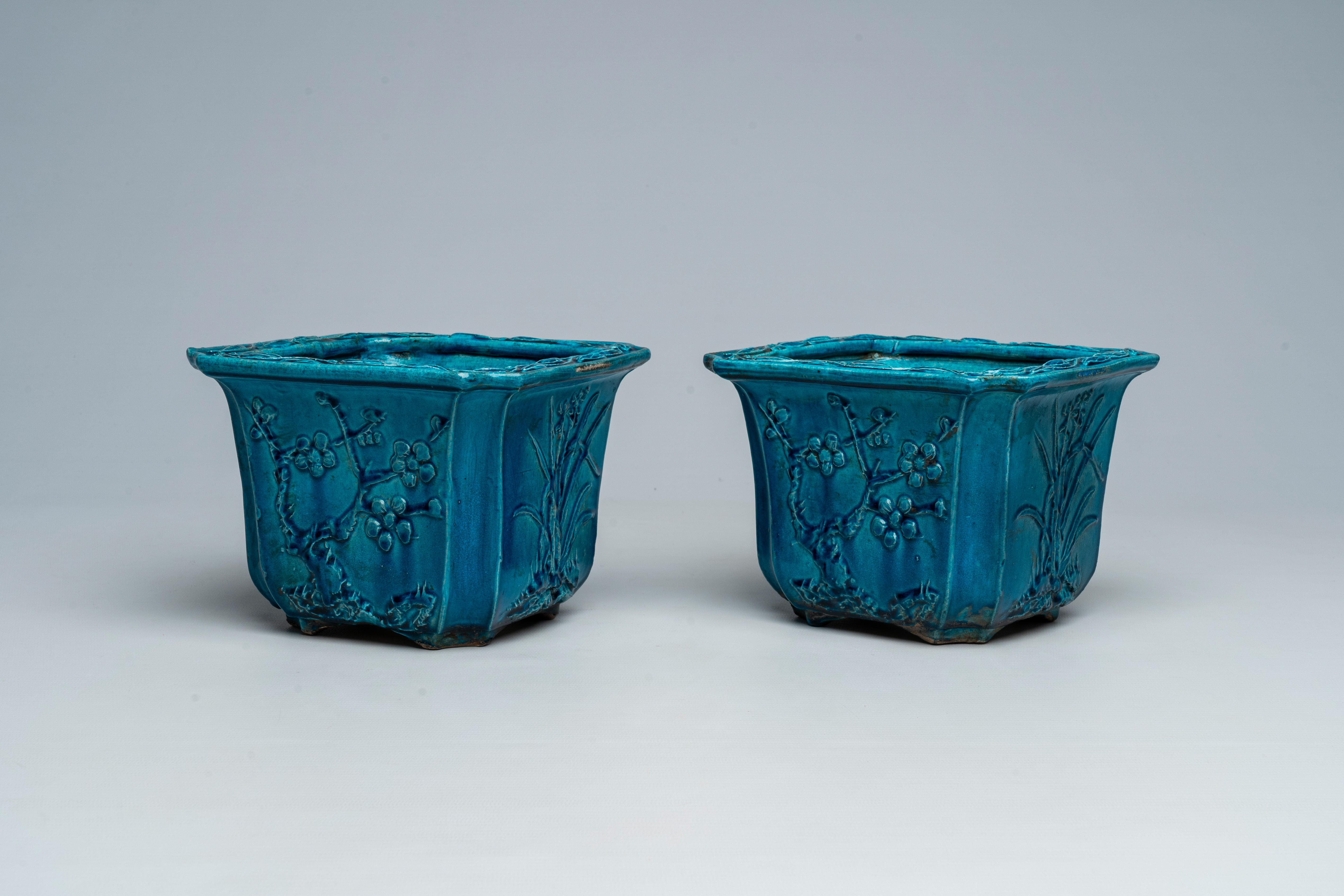 A pair of Chinese monochrome turquoise jardiniÃ¨res with floral relief design, 19th C. - Image 8 of 8