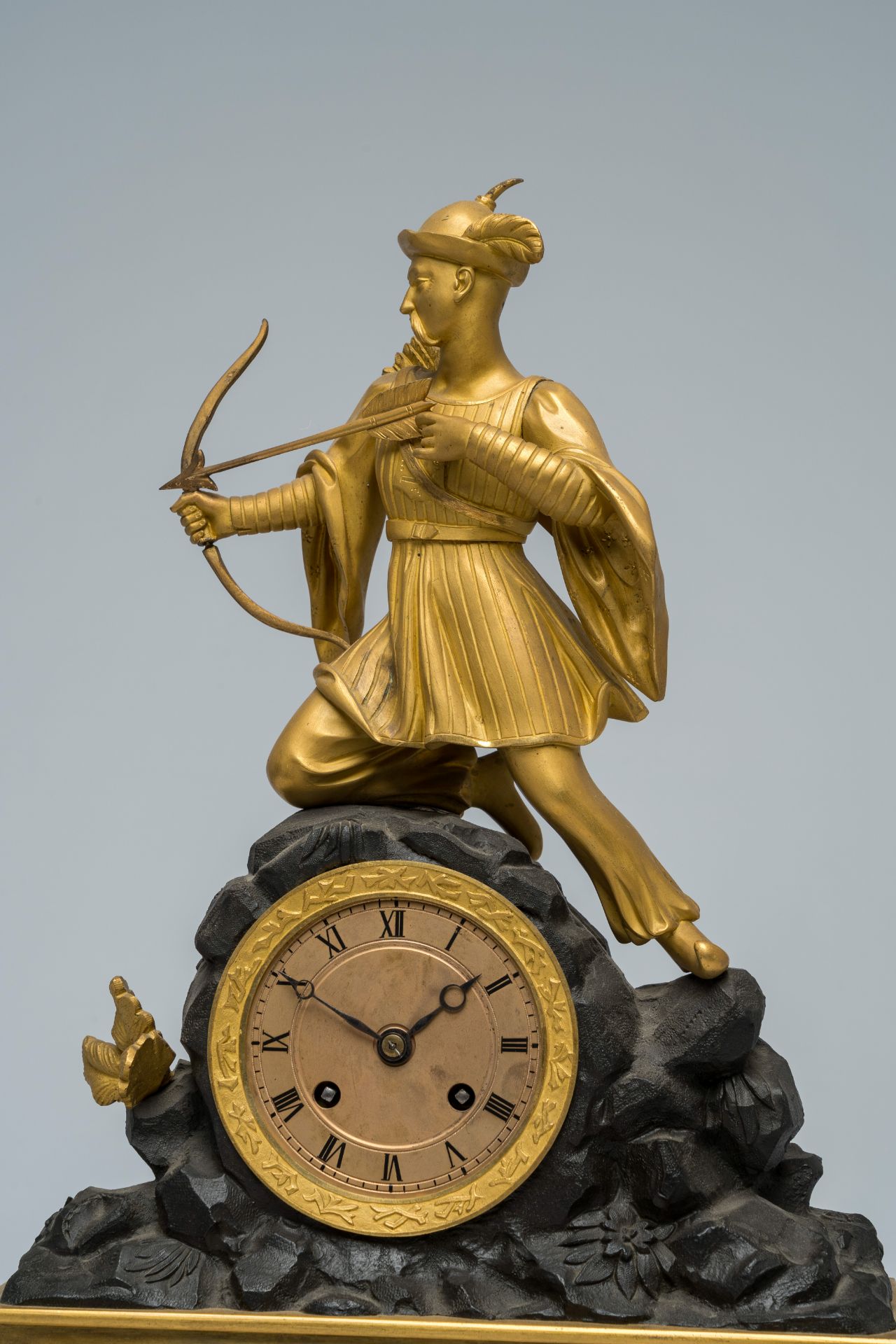 A French gilt and patinated bronze mantel clock topped with a Moorish archer, 19th C. - Image 8 of 9