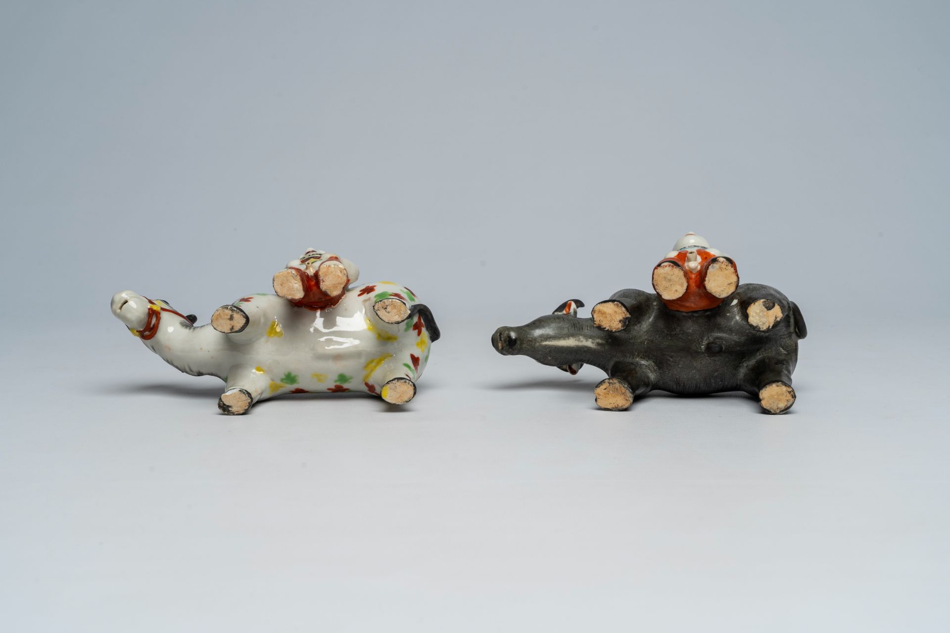 Two Chinese porcelain groups with a buffalo and a donkey with a boy, 19th/20th C. - Image 7 of 7