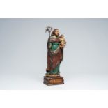 A French carved and polychrome painted group with Saint Joseph and Christ, 19th C.