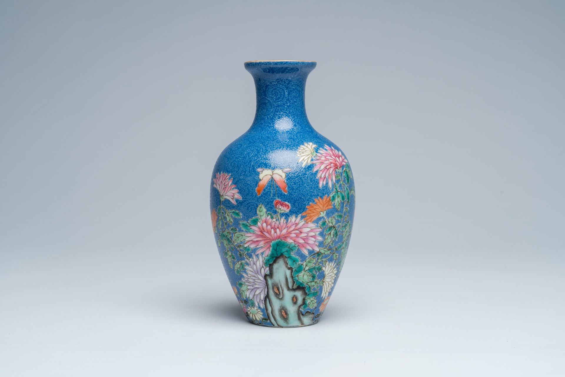 A Chinese famille rose blue-ground sgraffito vase with floral design, Hongxian mark, Republic, 20th