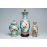 Three various Chinese famille rose vases, one of which mounted as a lamp, 20th C.