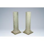 A pair of light green natural stone fluted columns, 20th C.