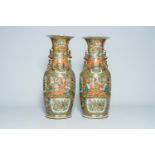 A pair of large Chinese Canton famille rose vases with palace scenes and floral design, 19th C.