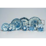 .A varied collection of Chinese blue and white porcelain with floral design and figures in a landsca