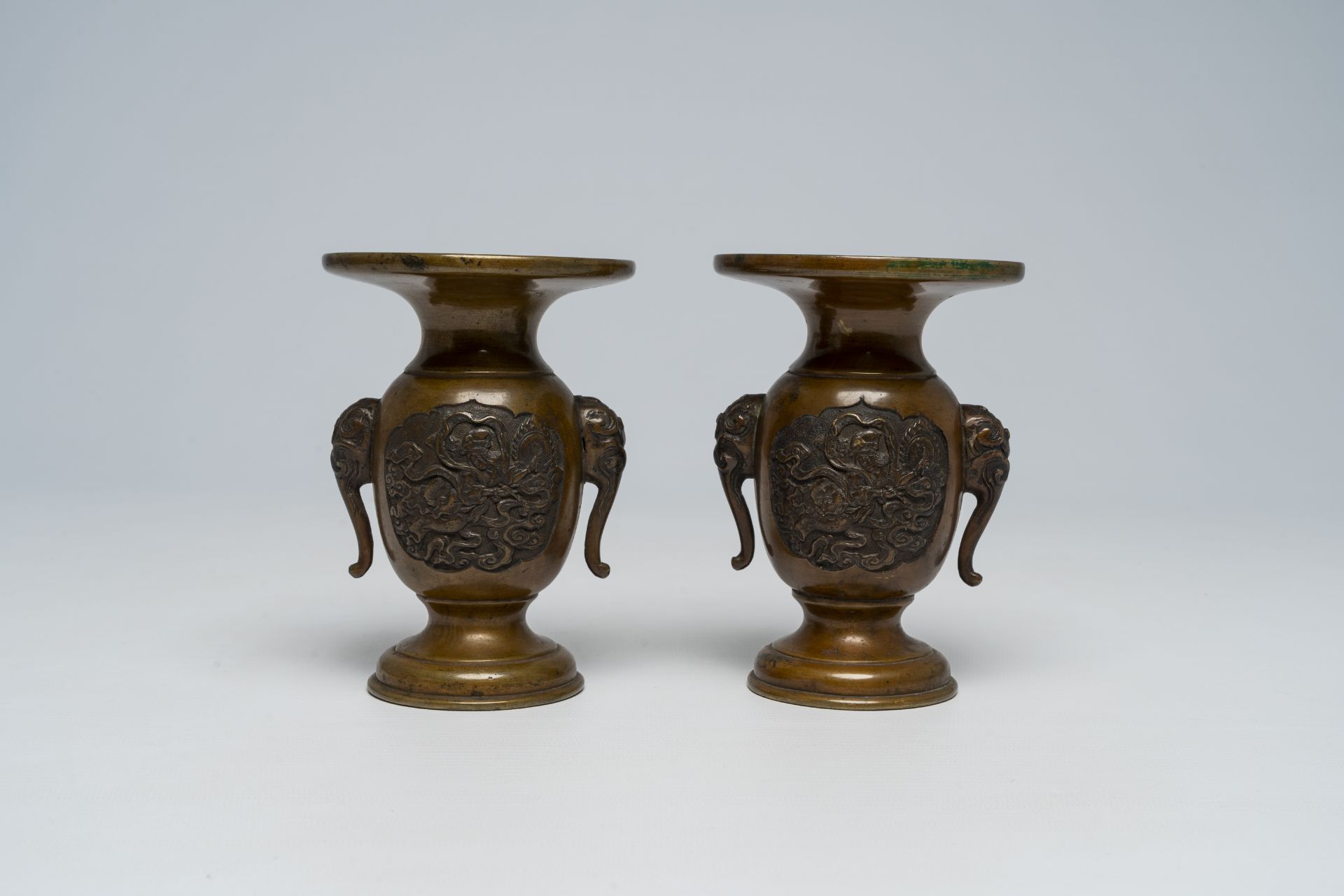 A pair of Japanese bronze vases, two mixed metal chargers with relief design, a blue and white dish - Image 7 of 21