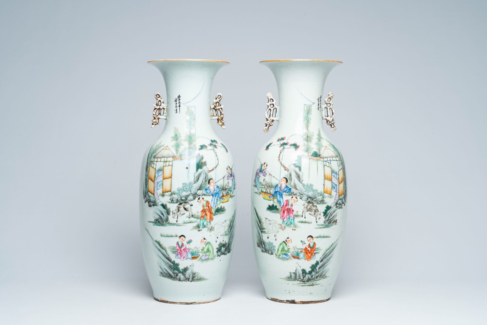 A pair of Chinese famille rose vases with playing children and goats in a landscape, 19th/20th C. - Image 2 of 7