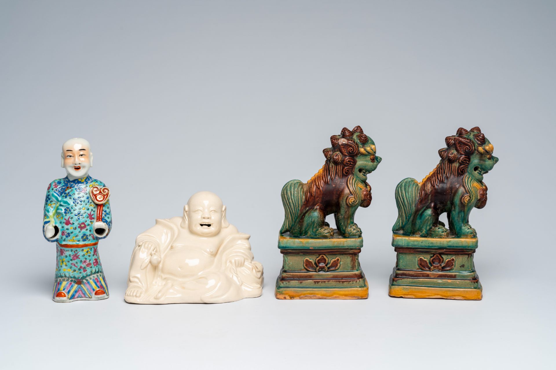 A Chinese blanc de Chine figure of Buddha, a pair of sancai glazed Buddhist lions and a famille rose - Image 2 of 10