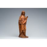 A Flemish Gothic Revival carved wood altar angel with traces of polychromy, 19th C.