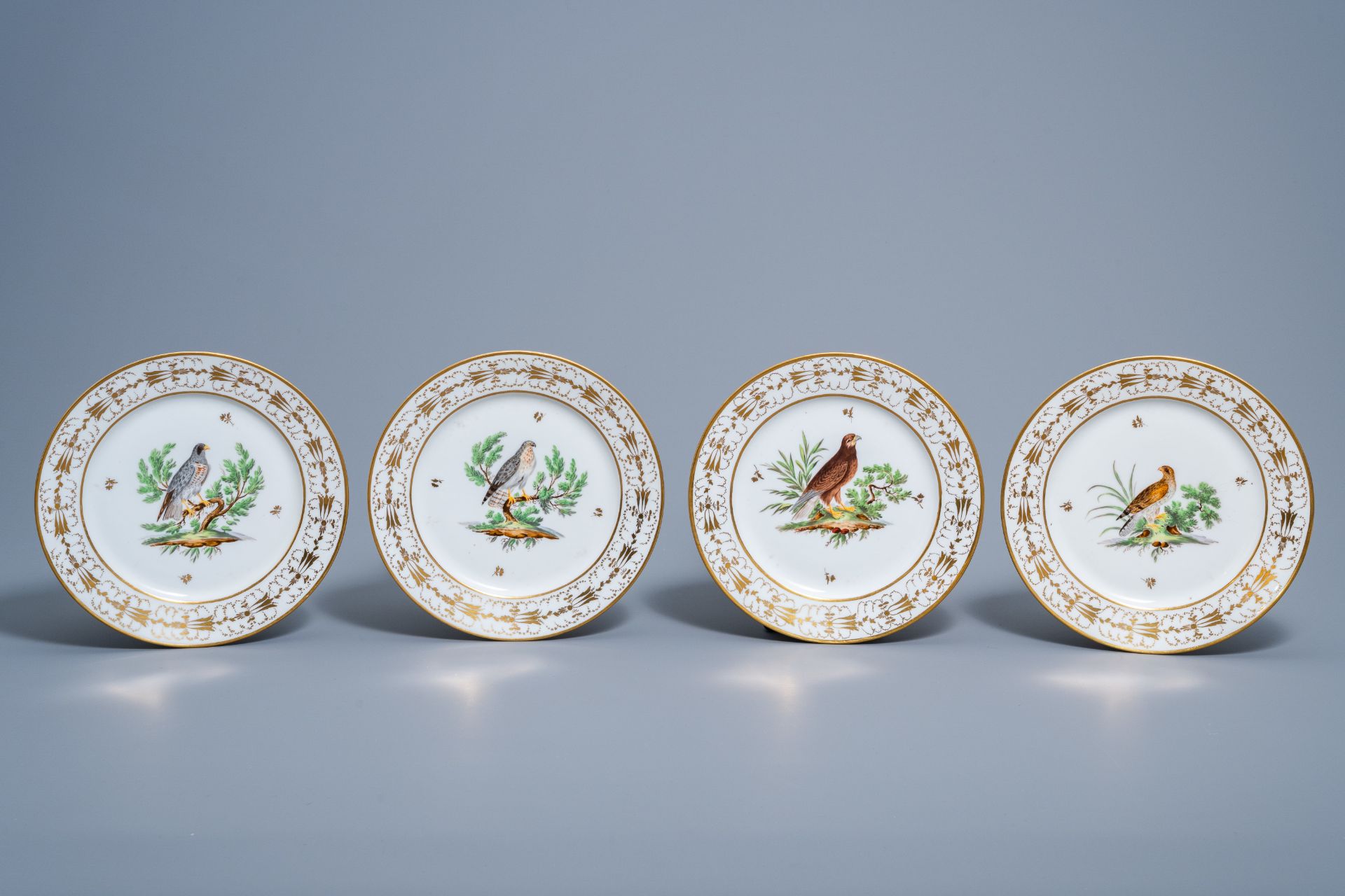 A set of eleven French plates and one oval charger with gilt and polychrome exotic birds design, fir - Image 4 of 9