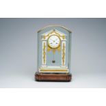 A French gilt bronze mounted white marble portico clock under glass dome and on a wooden base, 19th