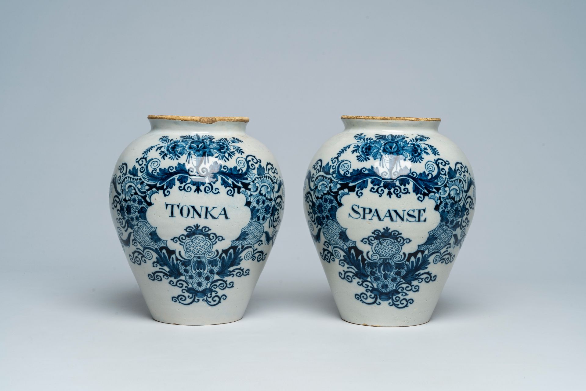 A pair of Dutch Delft blue and white tobacco jars with brass lids, 18th C. - Image 2 of 7