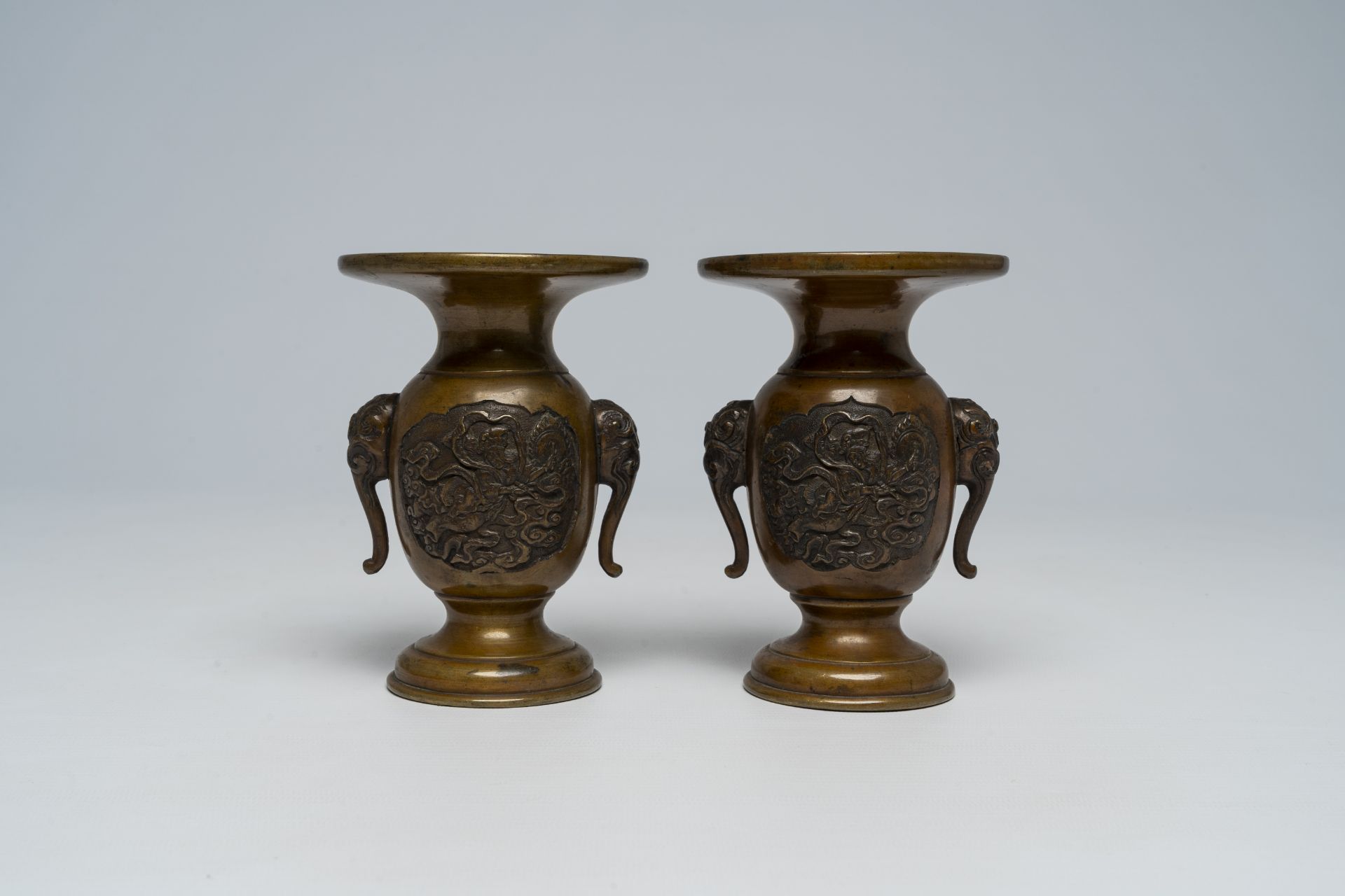 A pair of Japanese bronze vases, two mixed metal chargers with relief design, a blue and white dish - Image 5 of 21