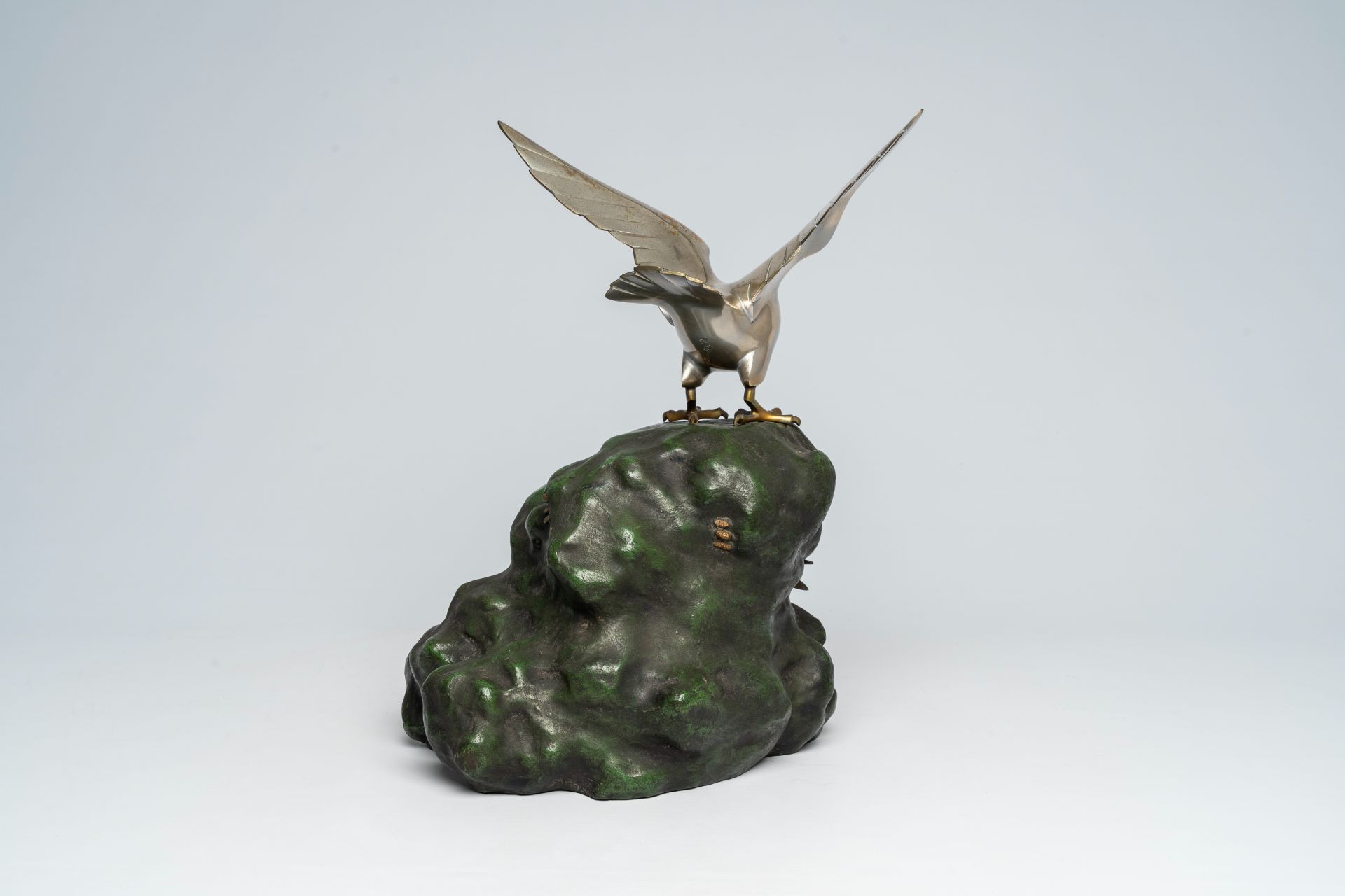 A Japanese patinated and silver-plated metal okimono of an eagle on a rock, signed Hidemasa, 20th C. - Image 13 of 17