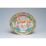 An oval Chinese Canton famille rose charger with a palace scene, 19th C.