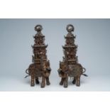 A pair of large Japanese bronze groups with elephants bearing pagoda, Edo/Meiji, 18th/19th C.