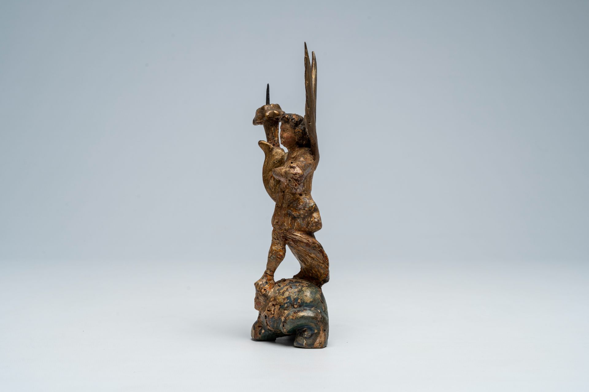 An Italian carved, polychrome painted and gilt wood archangel Michael shaped candlestick, 17th C. - Image 3 of 9