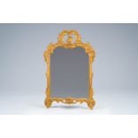 A French Louis XV style gilt wood mirror, 19th C.