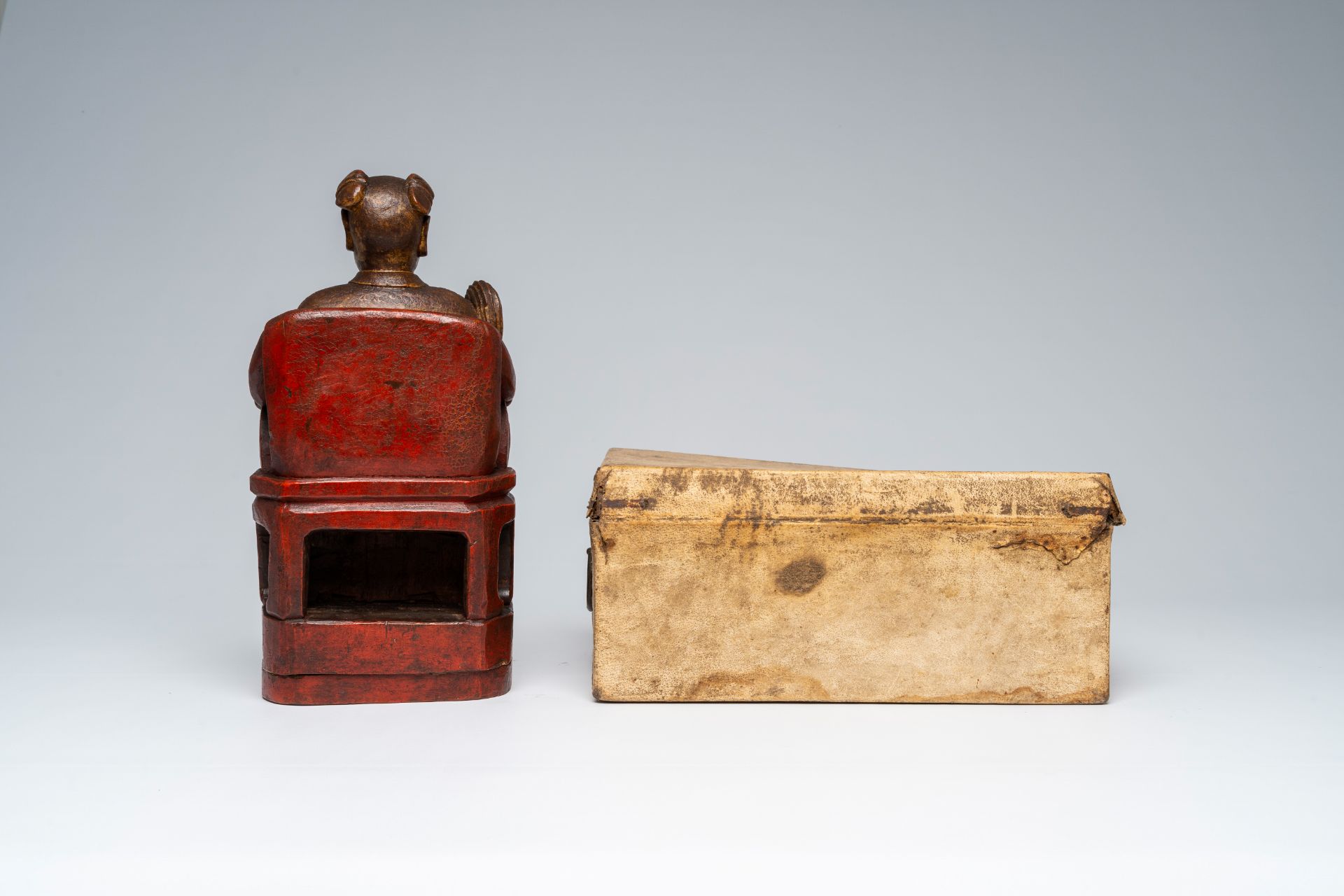 A Chinese polychrome wood sculpture, a collection of printing stamps and a travel case, 19th/20th C. - Image 8 of 11