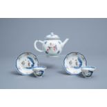 A Chinese famille rose teapot and a pair of cups and saucers, Qianlong