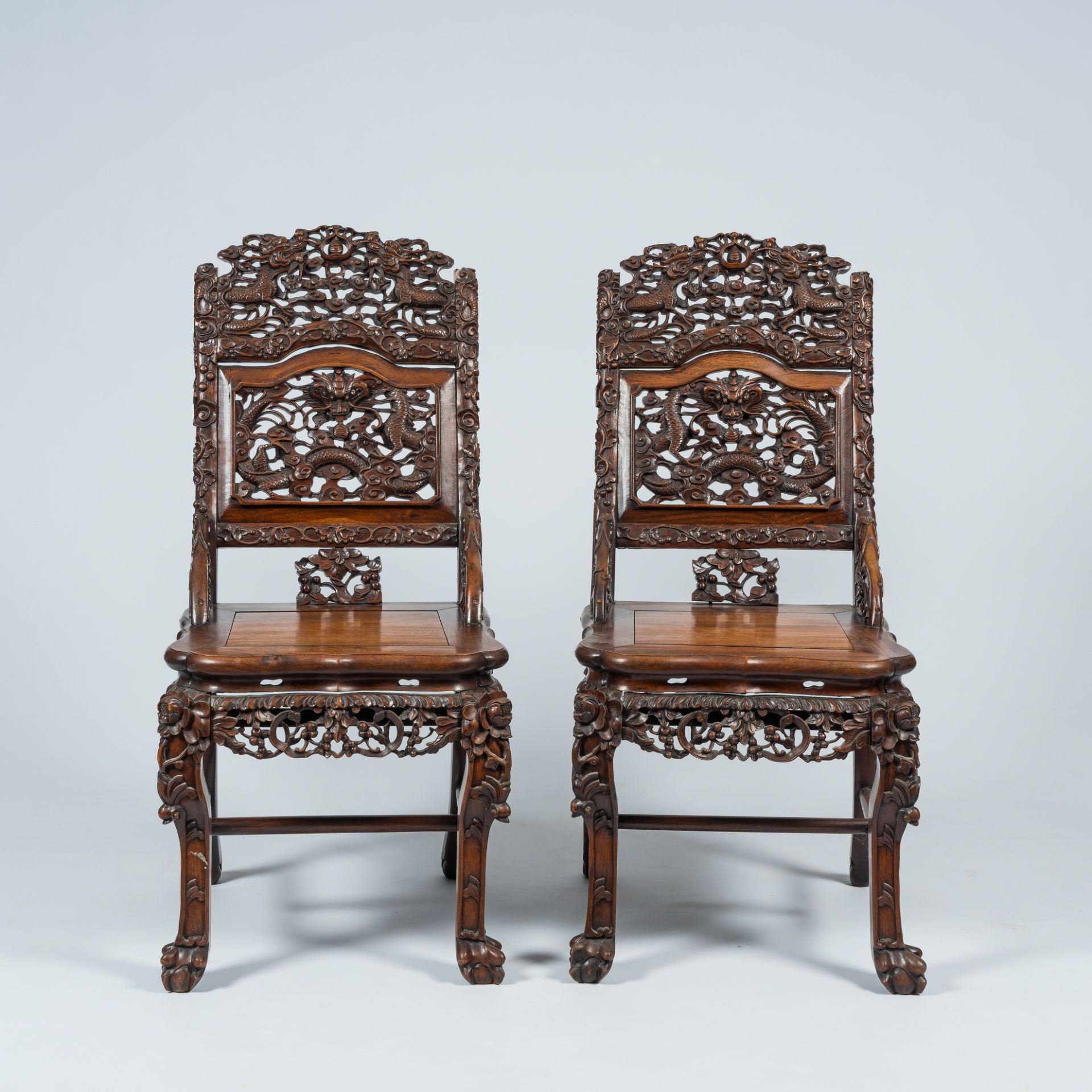 A pair of Chinese carved hardwood 'dragon' chairs, 19th C. - Image 2 of 10