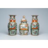 Three Chinese Canton famille rose vases with palace scenes and floral design, 19th C.