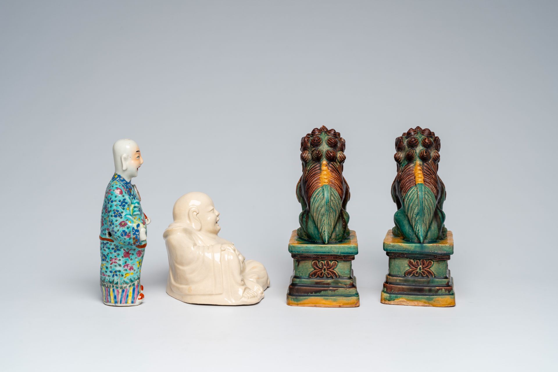 A Chinese blanc de Chine figure of Buddha, a pair of sancai glazed Buddhist lions and a famille rose - Image 5 of 10