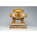 An Italian patinated and gilt wood Baroque tombe-shaped reliquary with various relics, 18th C.