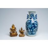 A Chinese blue and white celadon ground vase with birds among blossoming branches and two Asian bron