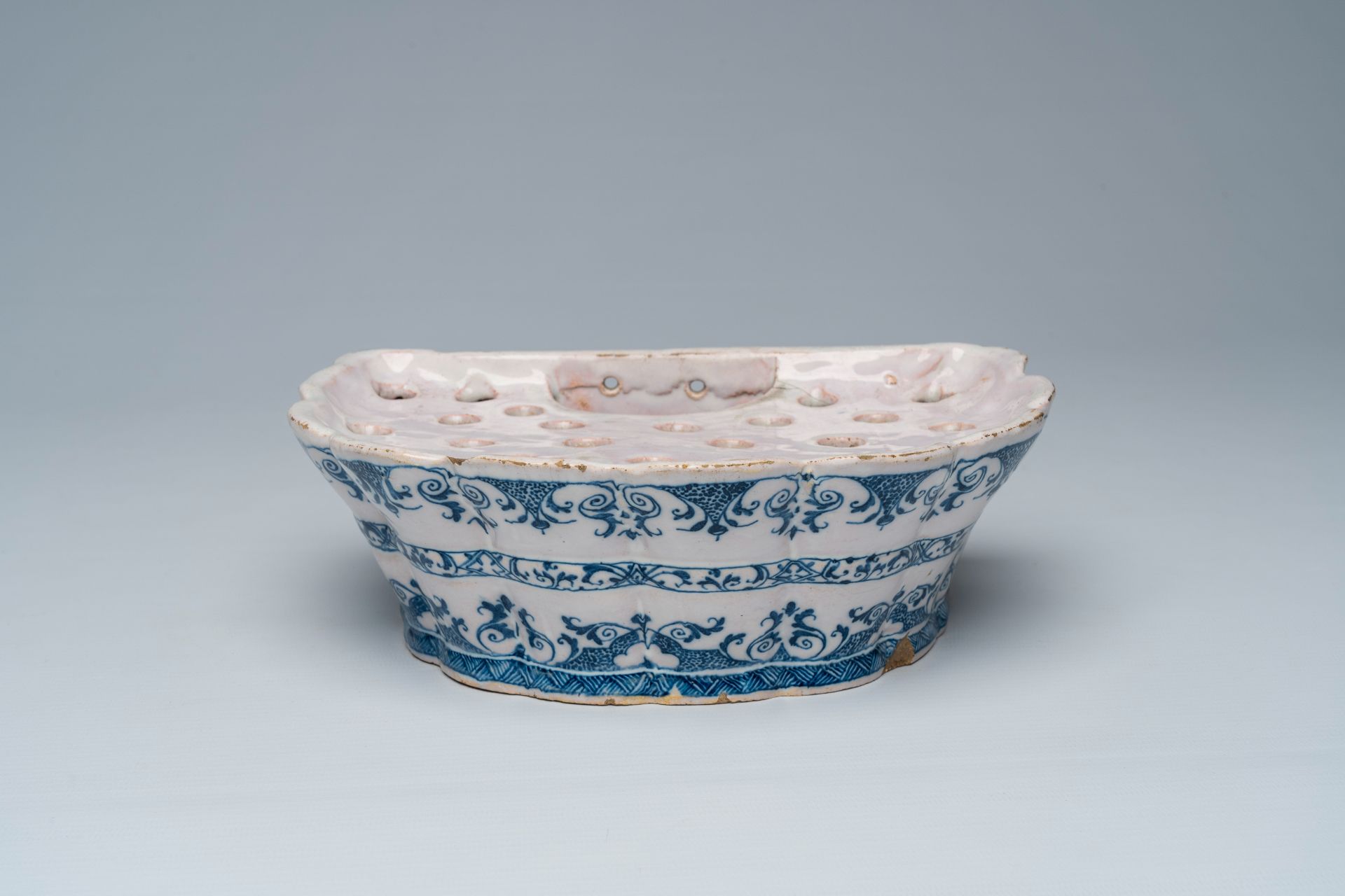 A blue and white Moustiers faience flower holder, France, 18th C.