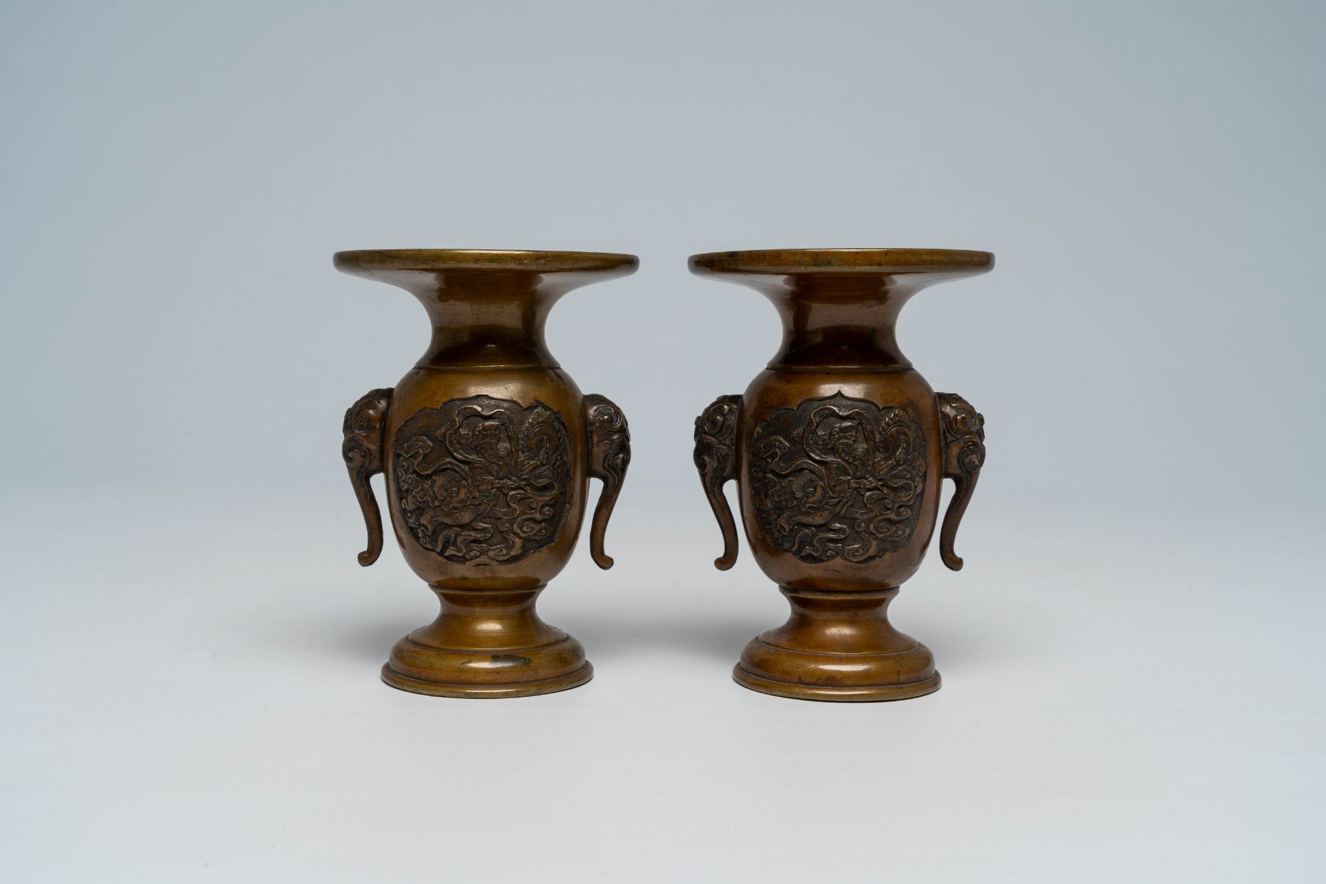 A pair of Japanese bronze vases, two mixed metal chargers with relief design, a blue and white dish - Image 16 of 21