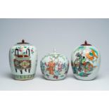 Three Chinese famille rose and qianjiang cai jars and covers with antiquities and figures in a lands