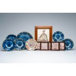 A varied collection of Dutch Delft blue, white and polychrome plates and chargers, manganese tiles a