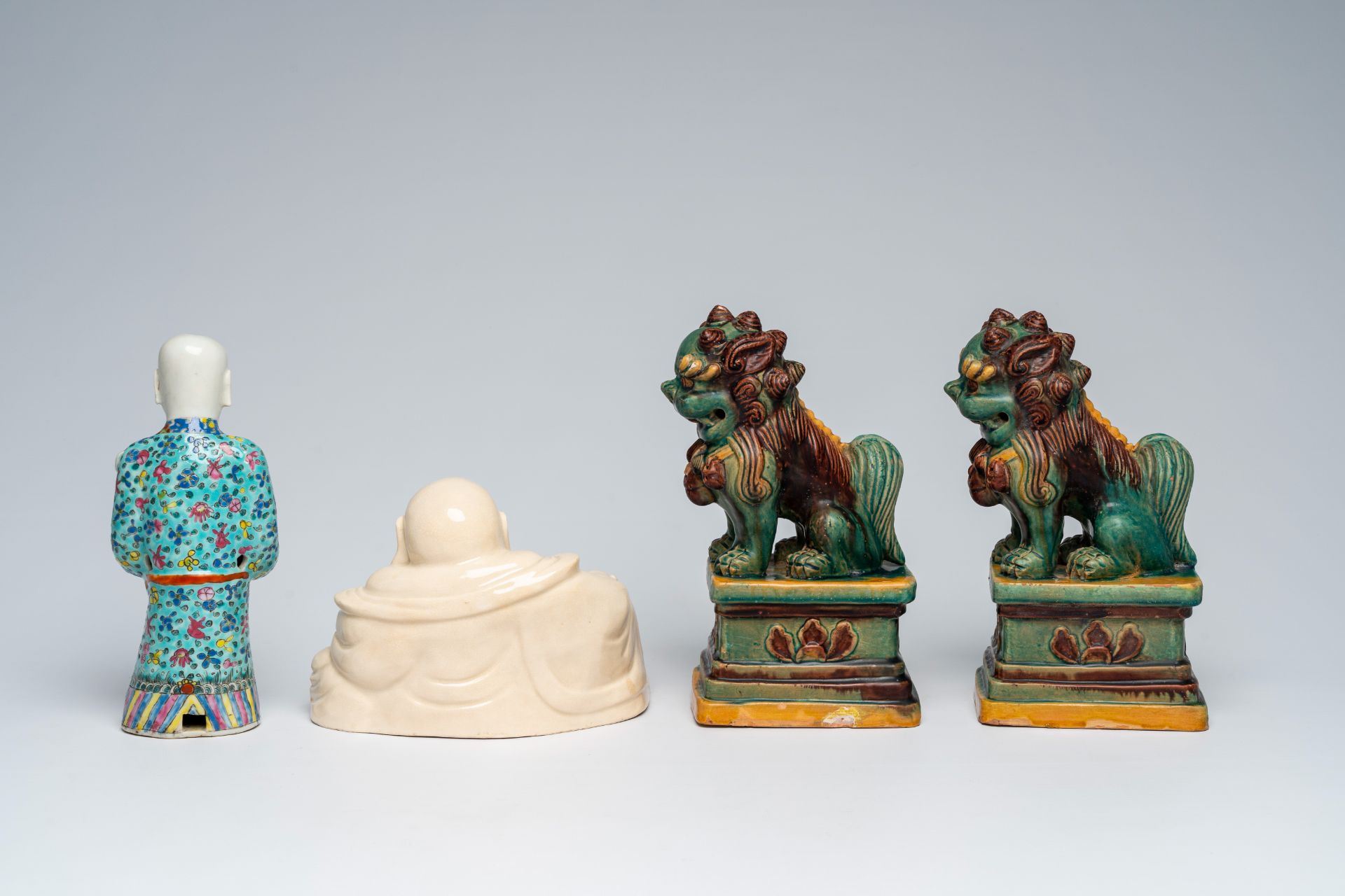A Chinese blanc de Chine figure of Buddha, a pair of sancai glazed Buddhist lions and a famille rose - Image 4 of 10