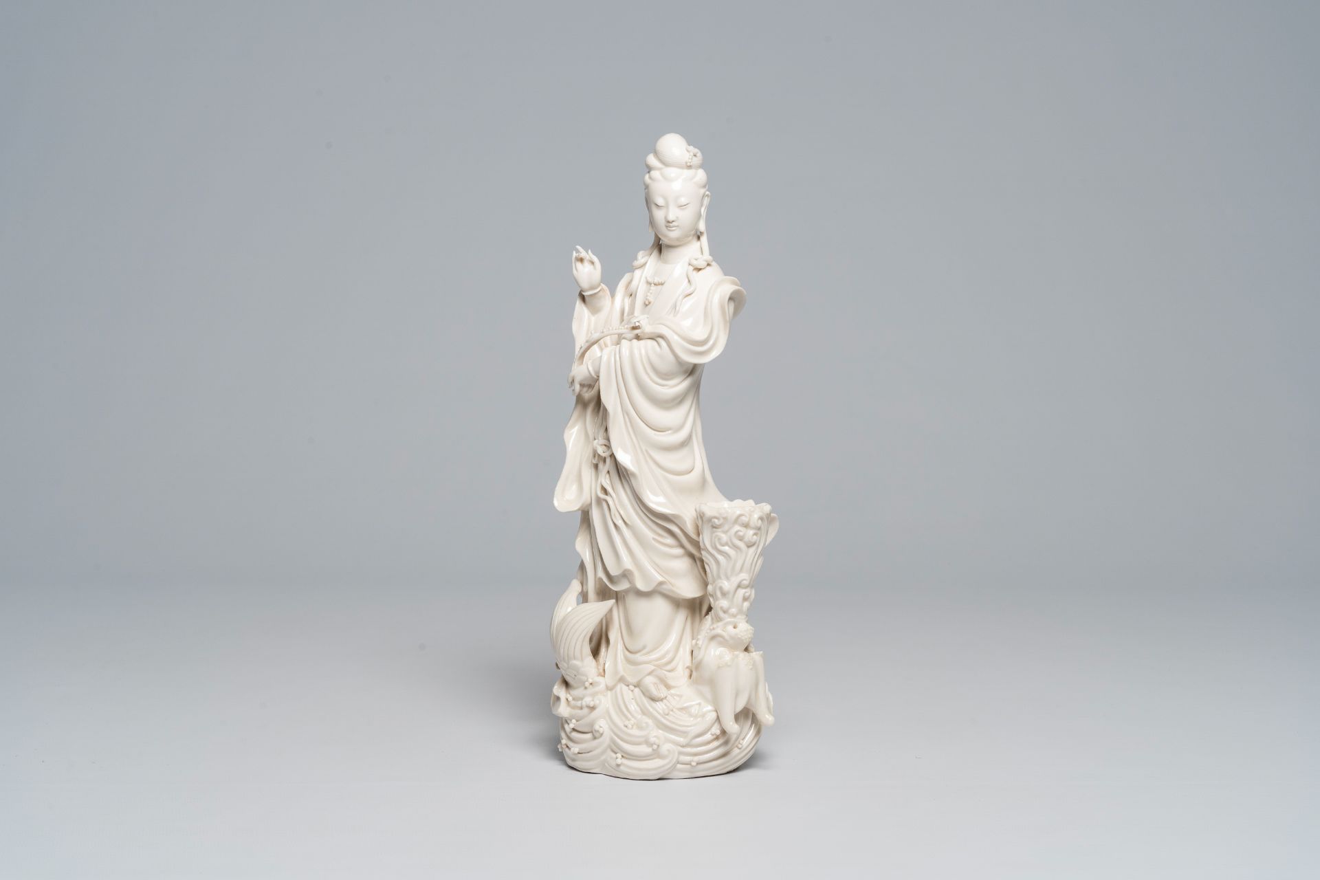 A Chinese Dehua blanc de Chine figure of Guanyin standing on a sea dragon, 20th C. - Image 2 of 8