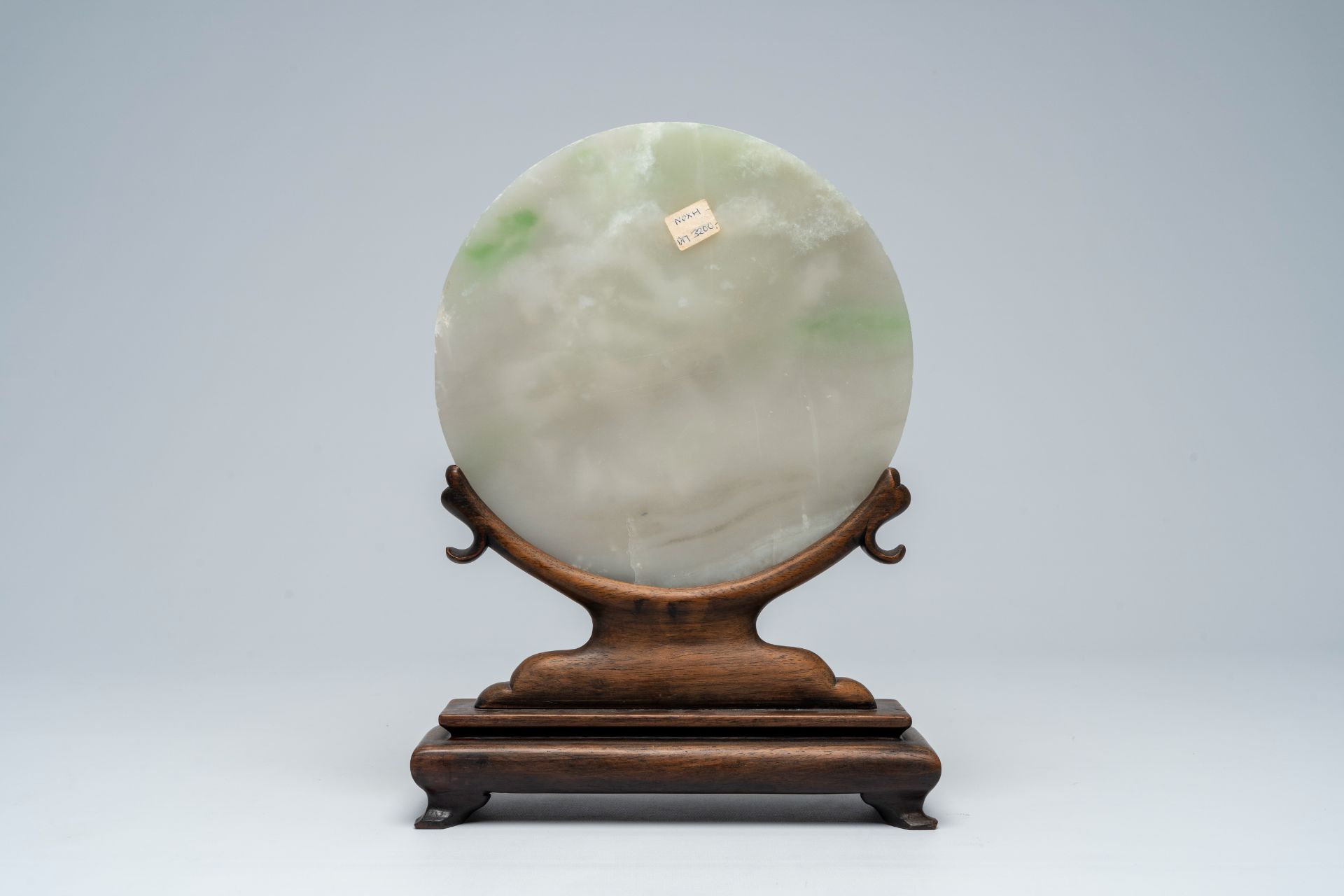 A large Chinese white jade plaque with figures in a landscape on a wooden stand, 19th/20th C - Image 3 of 9