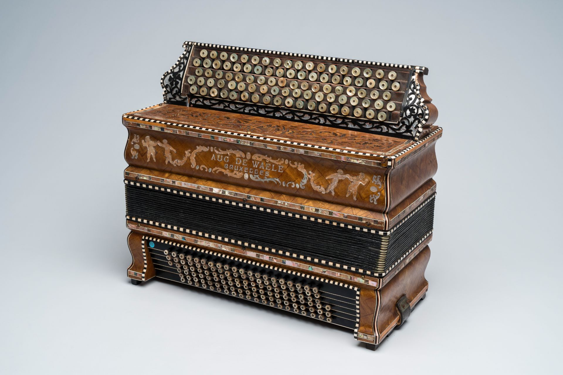 A Belgian 'August De Waele' chromatic accordion with button keyboard, ca. 1920