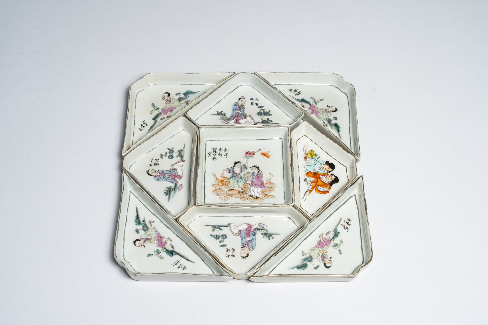 A Chinese famille rose sweetmeat or rice table set with figures, 19th/20th C.