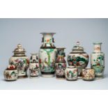 A varied collection of Chinese Nanking crackle glazed famille rose and verte vases and jars with war