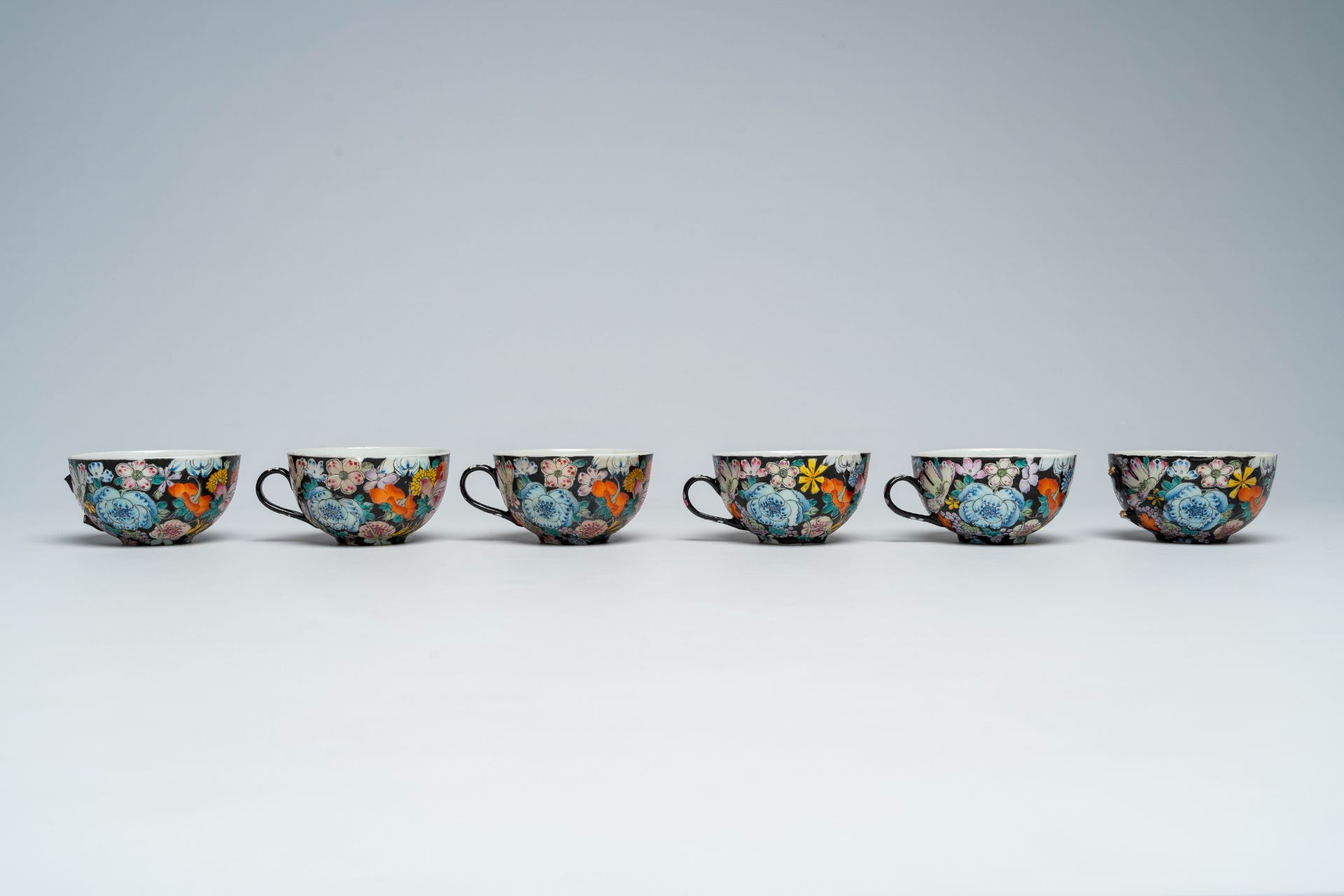 A Chinese fifteen-piece famille rose 'millefleurs' tea set with matching case, Guangxu mark, 20th C. - Image 14 of 20