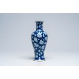 A Chinese blue and white prunus on cracked ice ground vase, Wanli mark, 19th C.