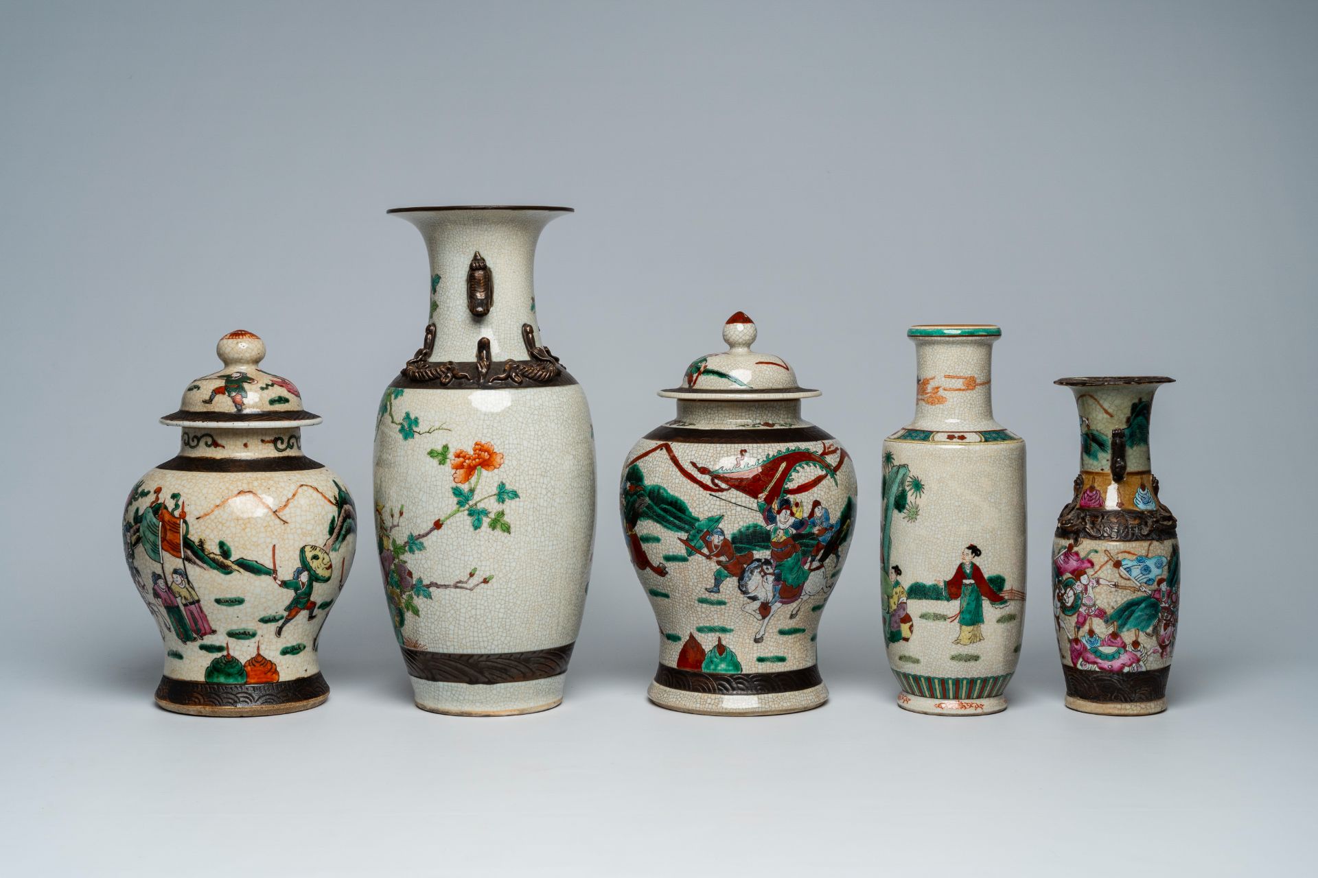 A varied collection of Chinese Nanking crackle glazed famille rose and verte vases and jars with war - Image 3 of 13