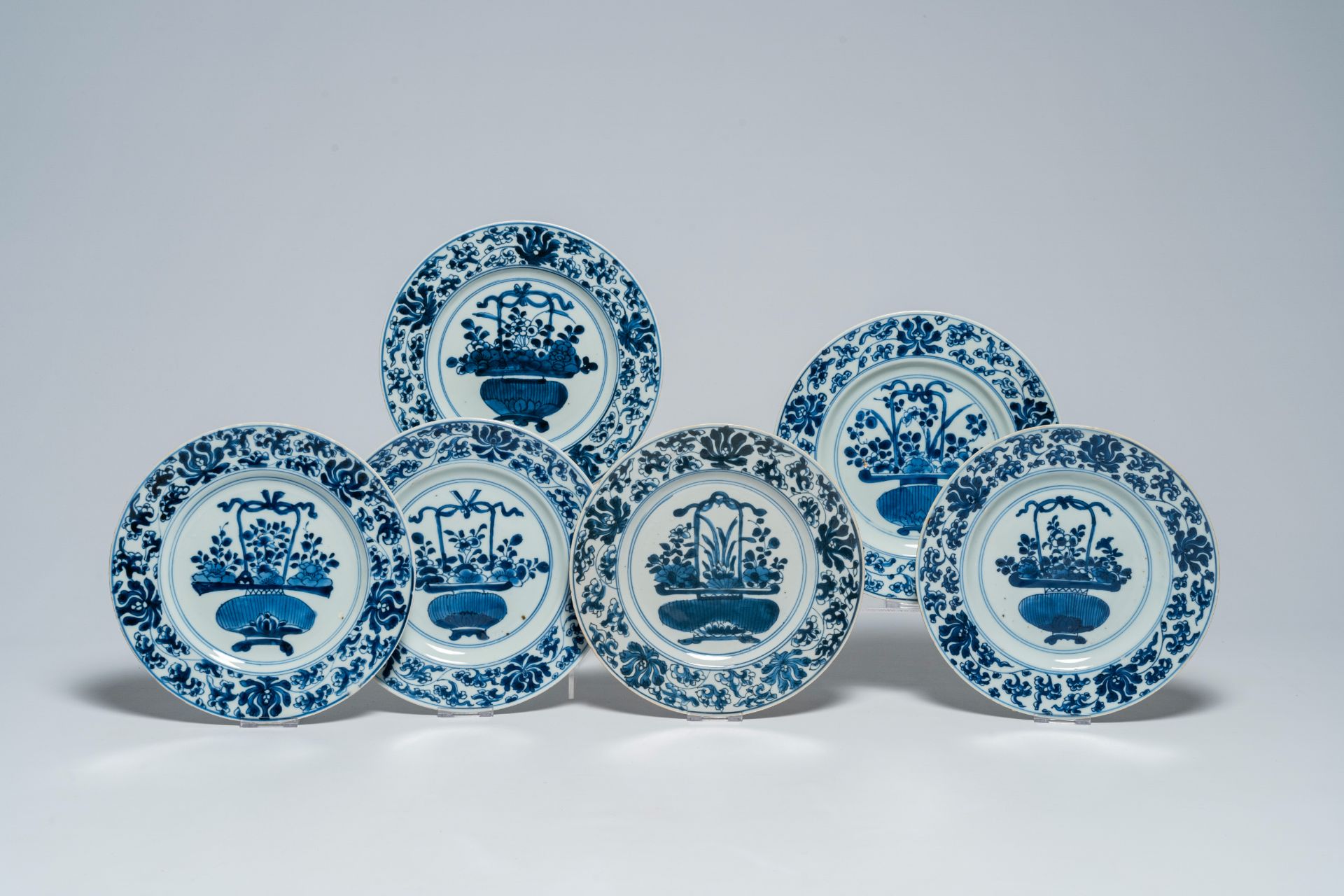 Six Chinese blue and white plates with a flower basket, Kangxi/Yongzheng
