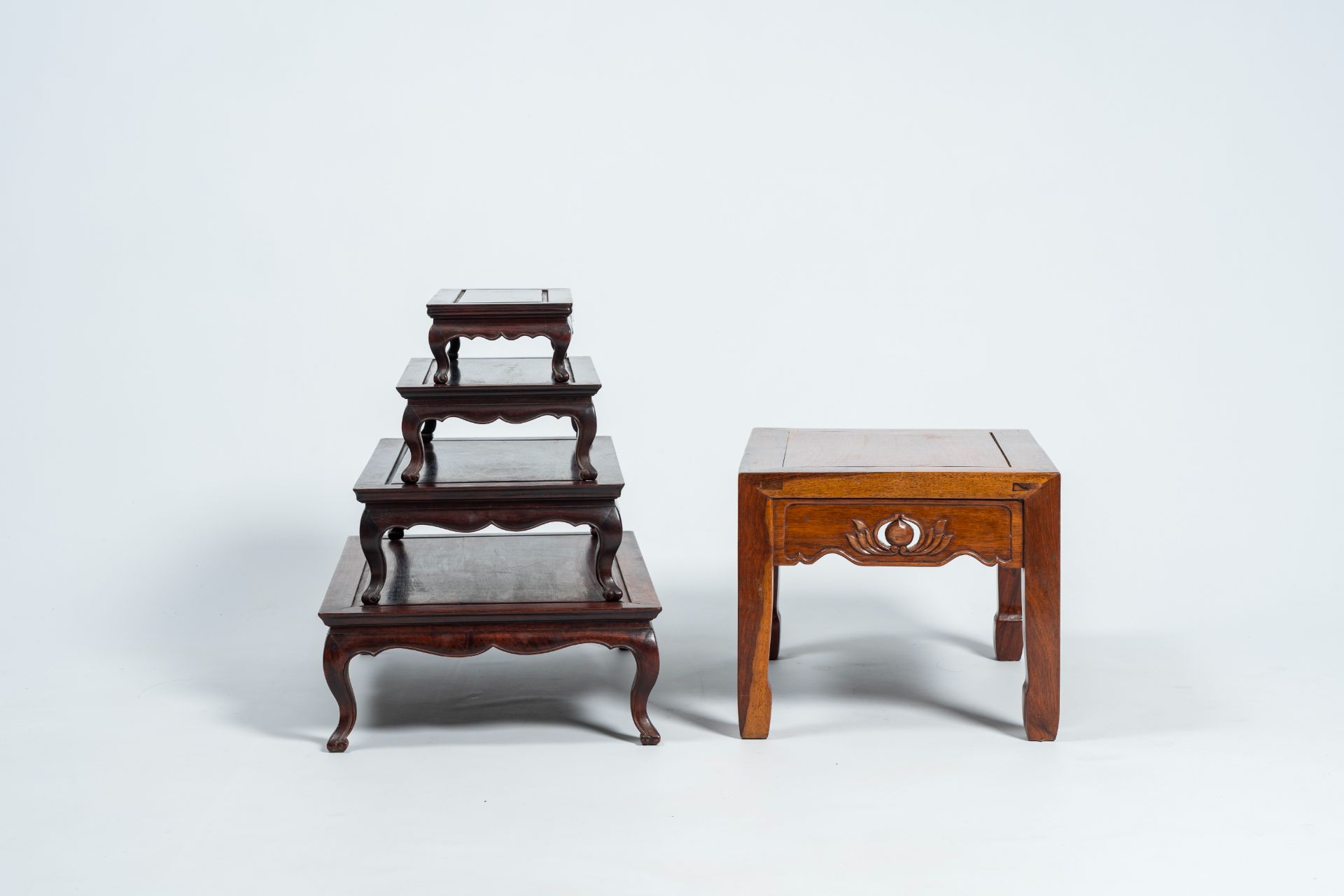 Four Chinese rectangular wood nesting tables and a side table with floral design, 20th C. - Image 6 of 8