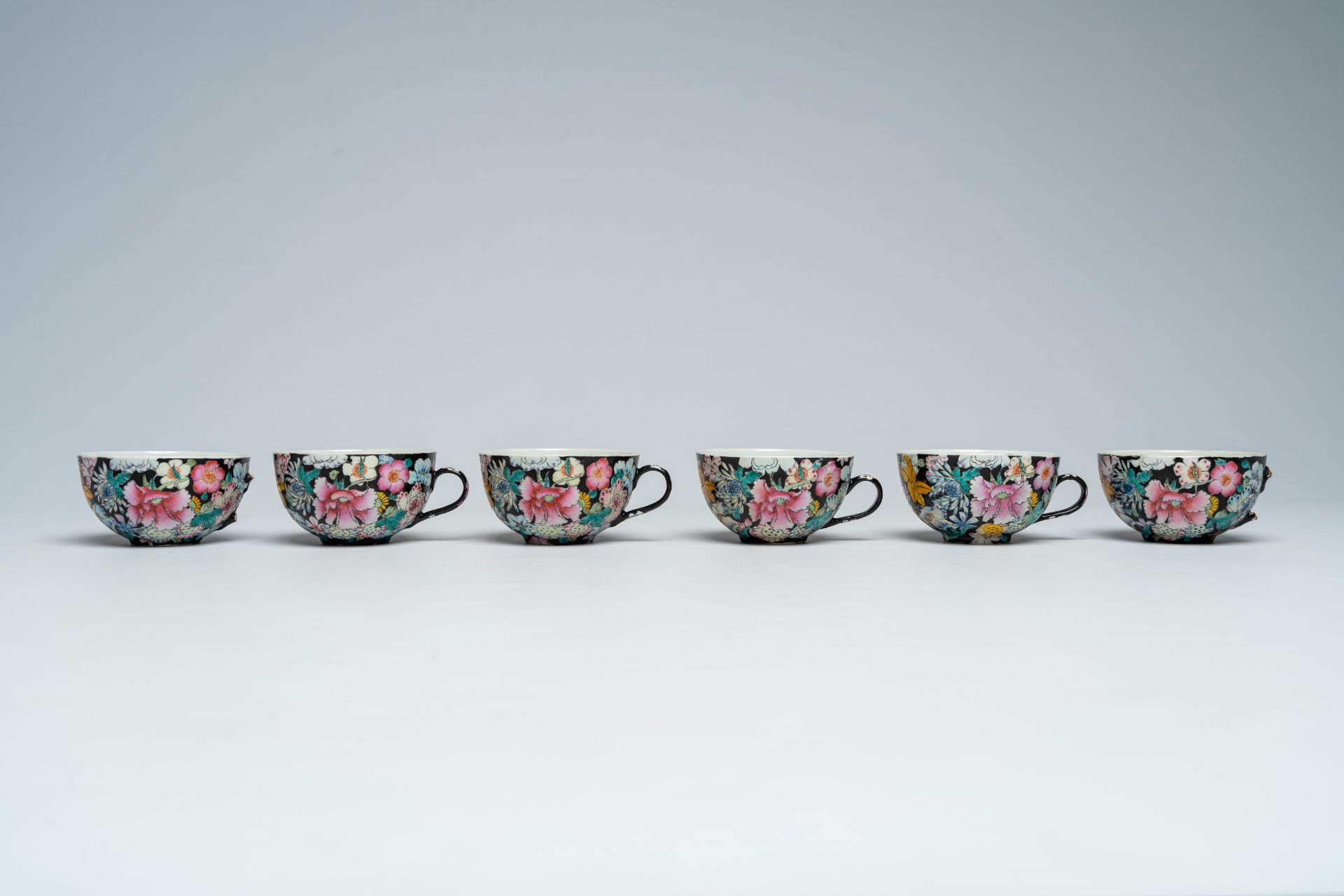 A Chinese fifteen-piece famille rose 'millefleurs' tea set with matching case, Guangxu mark, 20th C. - Image 12 of 20