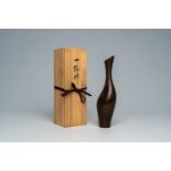 A stylized Japanese bronze crane-shaped vase with brown marbled patina, Sugai Shozo (act. 1915-1971)